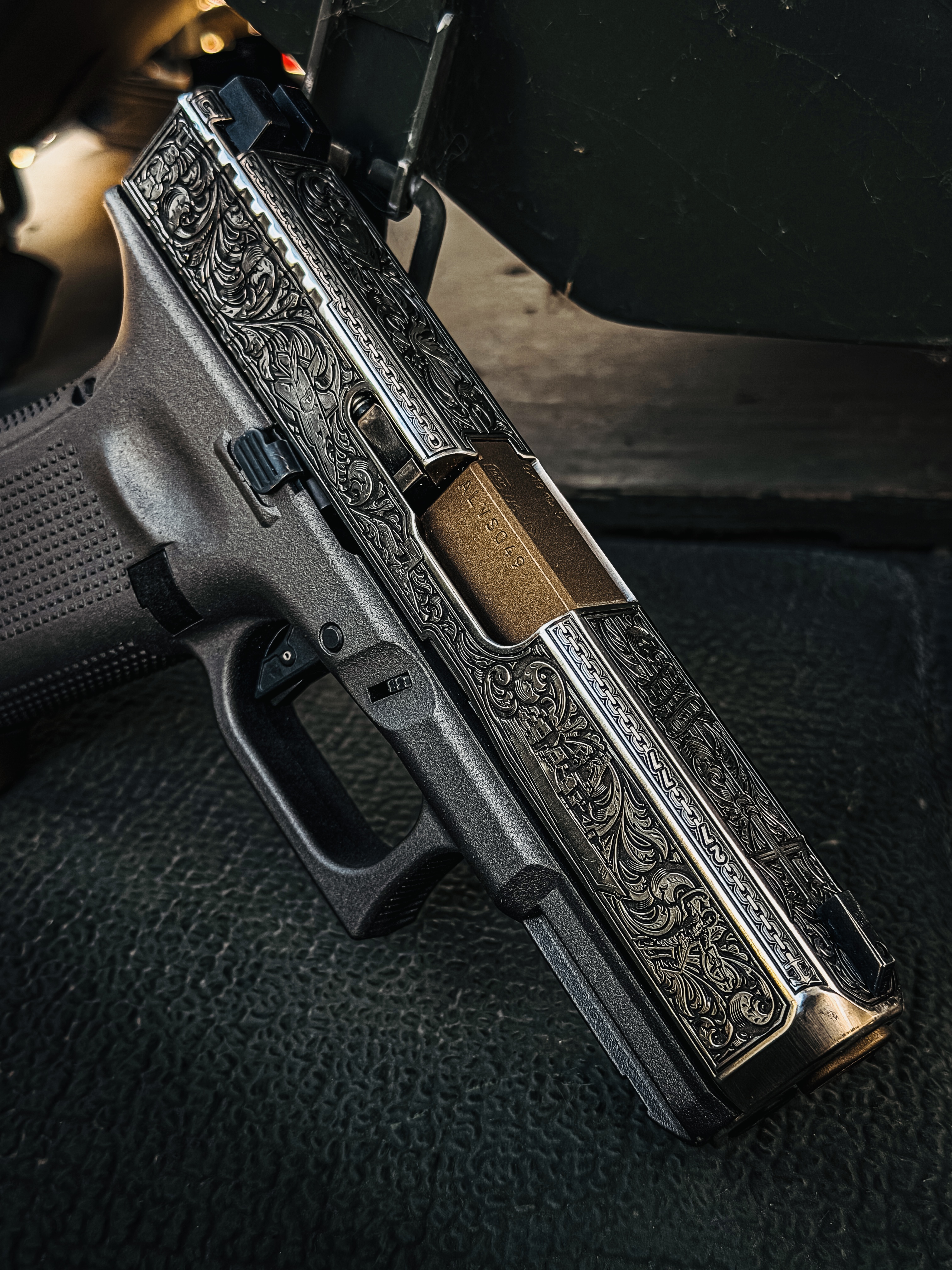 USNA Class of 2027 GLOCK 19X V — engraved slide and bronze barrel detail