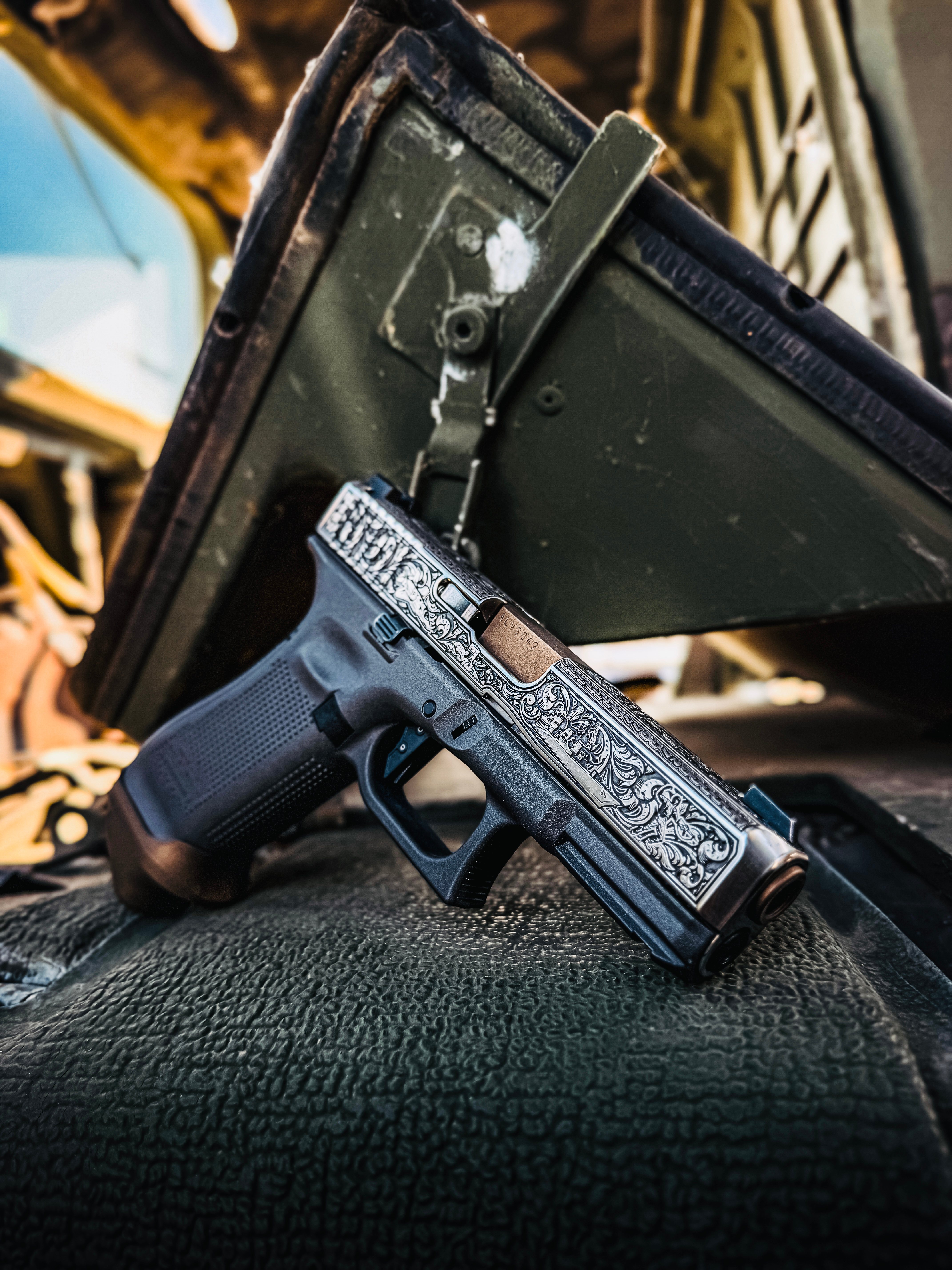 USNA Class of 2027 GLOCK 19X V — macro slide engraving detail with cross motif