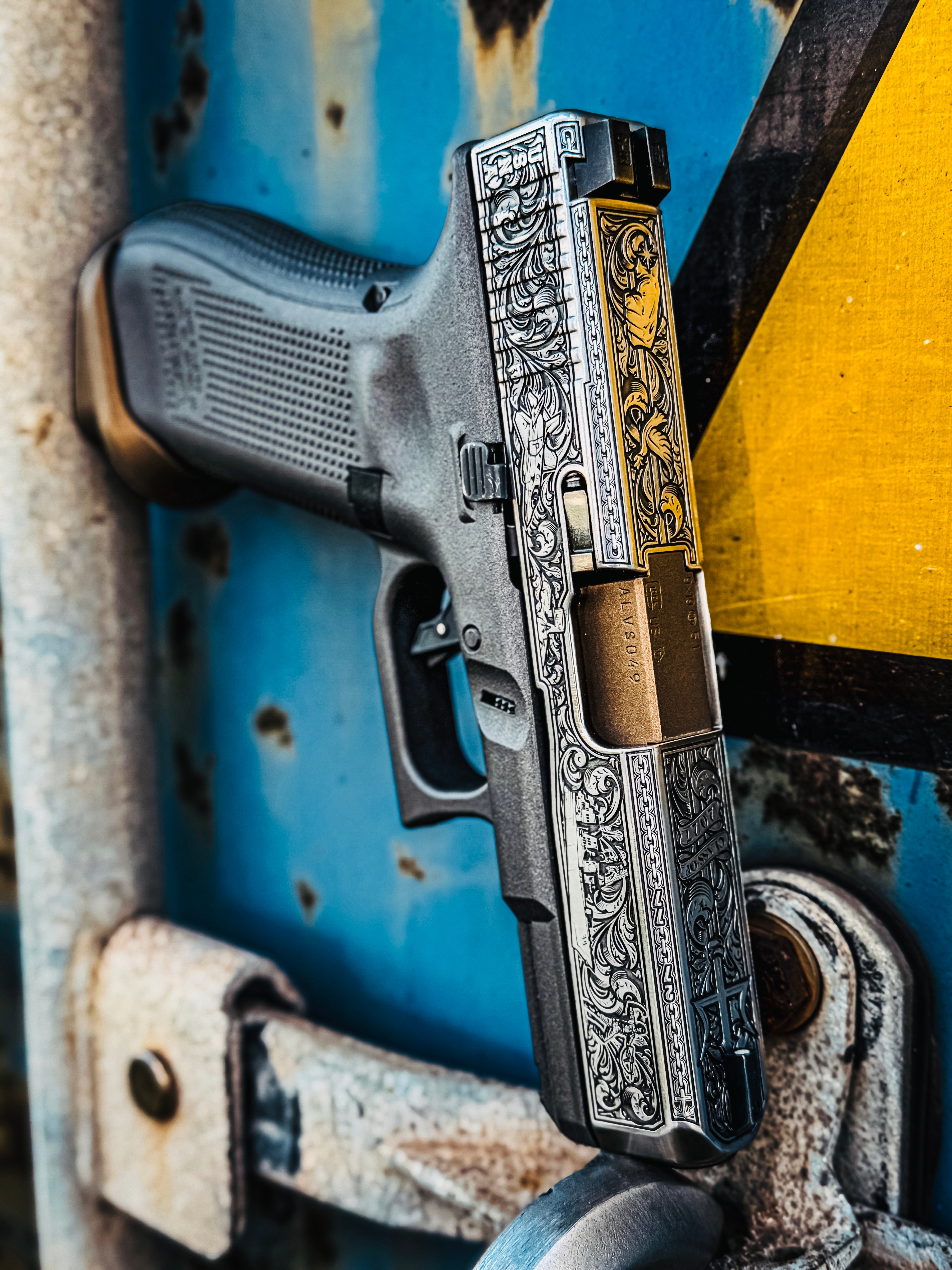 USNA Class of 2027 GLOCK 19X V — “Don't Give Up the Ship” and “De Profundis Ad Caelos Vincinus” slide engraving detail